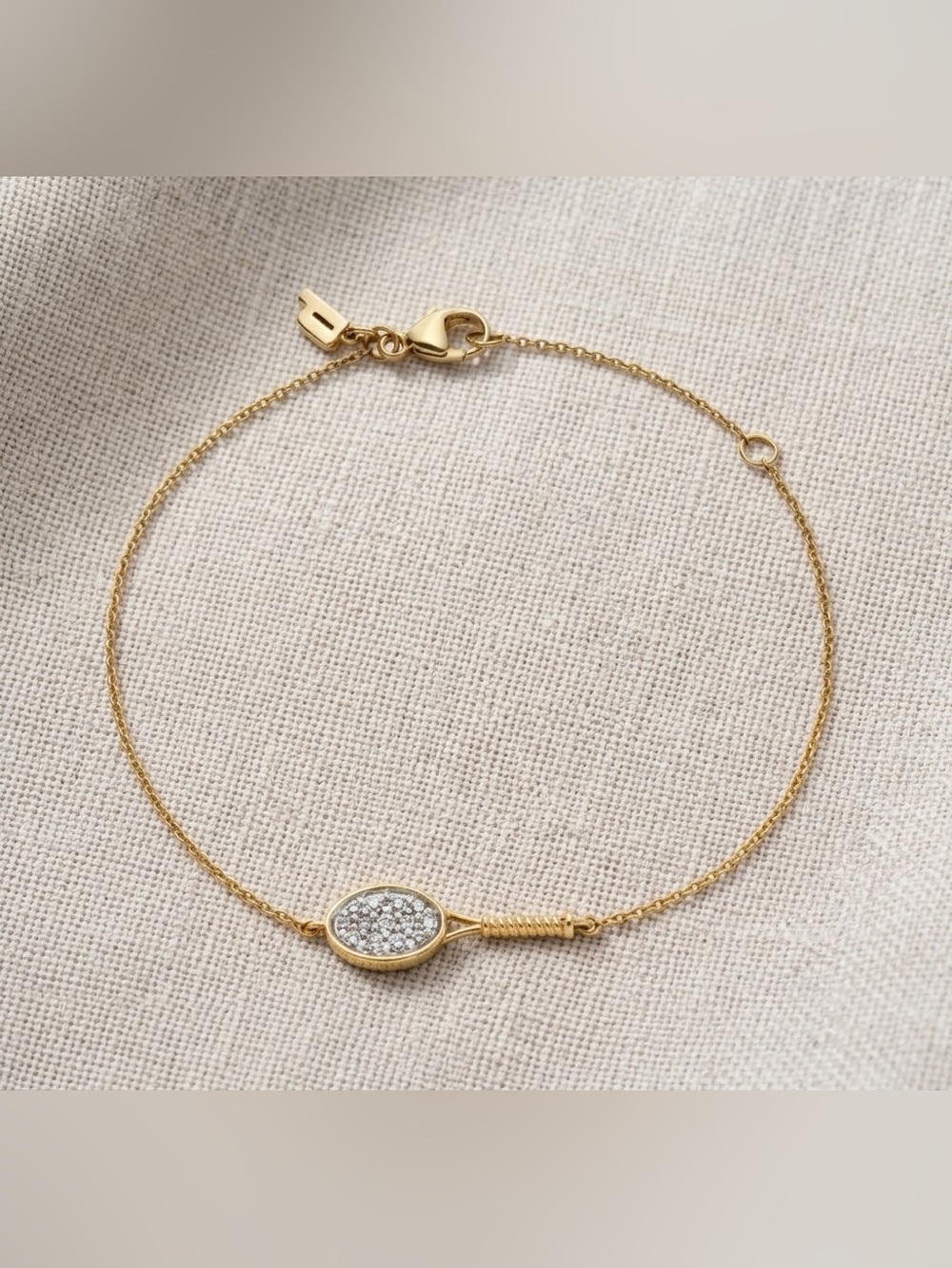 Preowned Prince 1/6 Carat T.W. Diamond Tennis Racquet Bracelet in 14K Gold